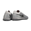 Chuteira Society Nike Phantom GX2 Elite Rising Gem Pack Turf TF