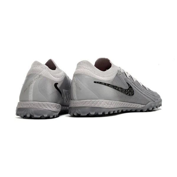 Chuteira Society Nike Phantom GX2 Elite Rising Gem Pack Turf TF