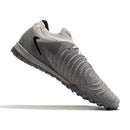 Chuteira Society Nike Phantom GX2 Elite Rising Gem Pack Turf TF