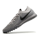 Chuteira Society Nike Phantom GX2 Elite Rising Gem Pack Turf TF